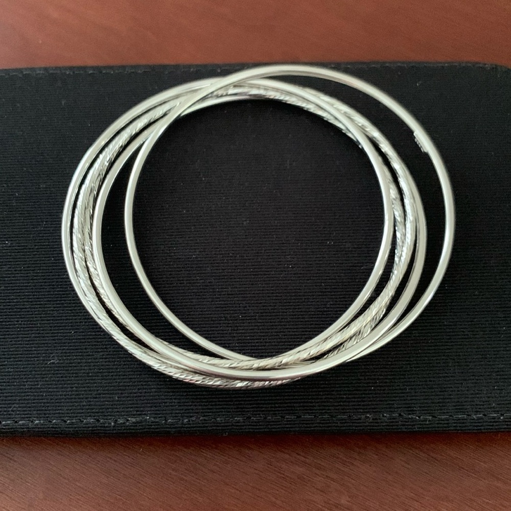 Sterling silver set of 5 connected bangle bracelets, 2 textured and 3 smooth